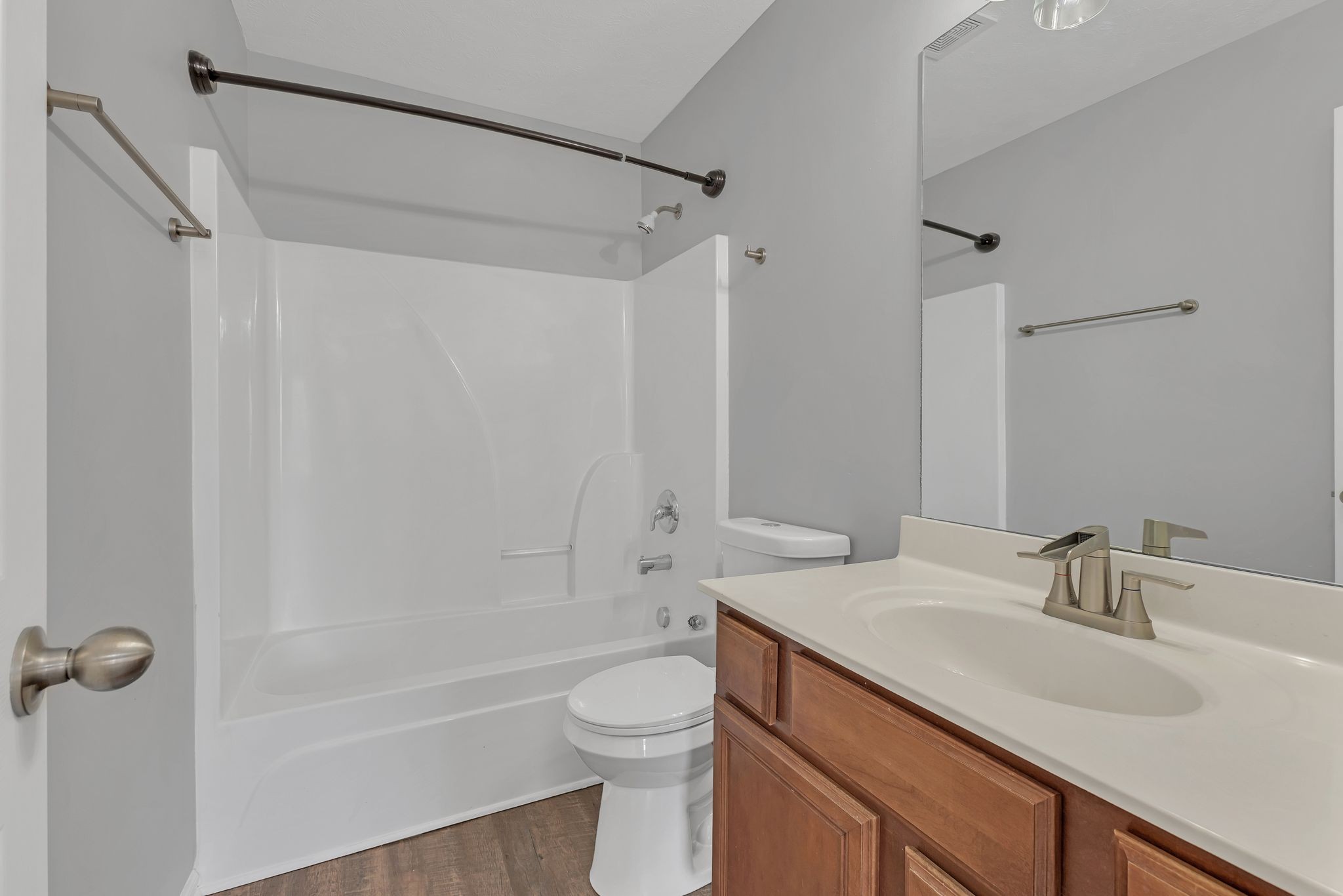 2011 Shaylin Loop, Unit 2011 Antioch, TN 37013 - Photo 18 of 26 a bathroom with a sink a toilet and shower