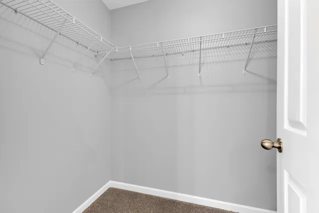 a view of a room with racks on the wall