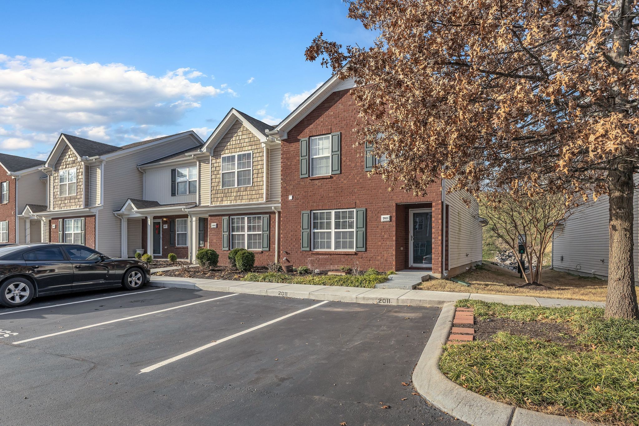 2011 Shaylin Loop, Unit 2011 Antioch, TN 37013 - Photo 2 of 26 a view of a parked cars in front of a building