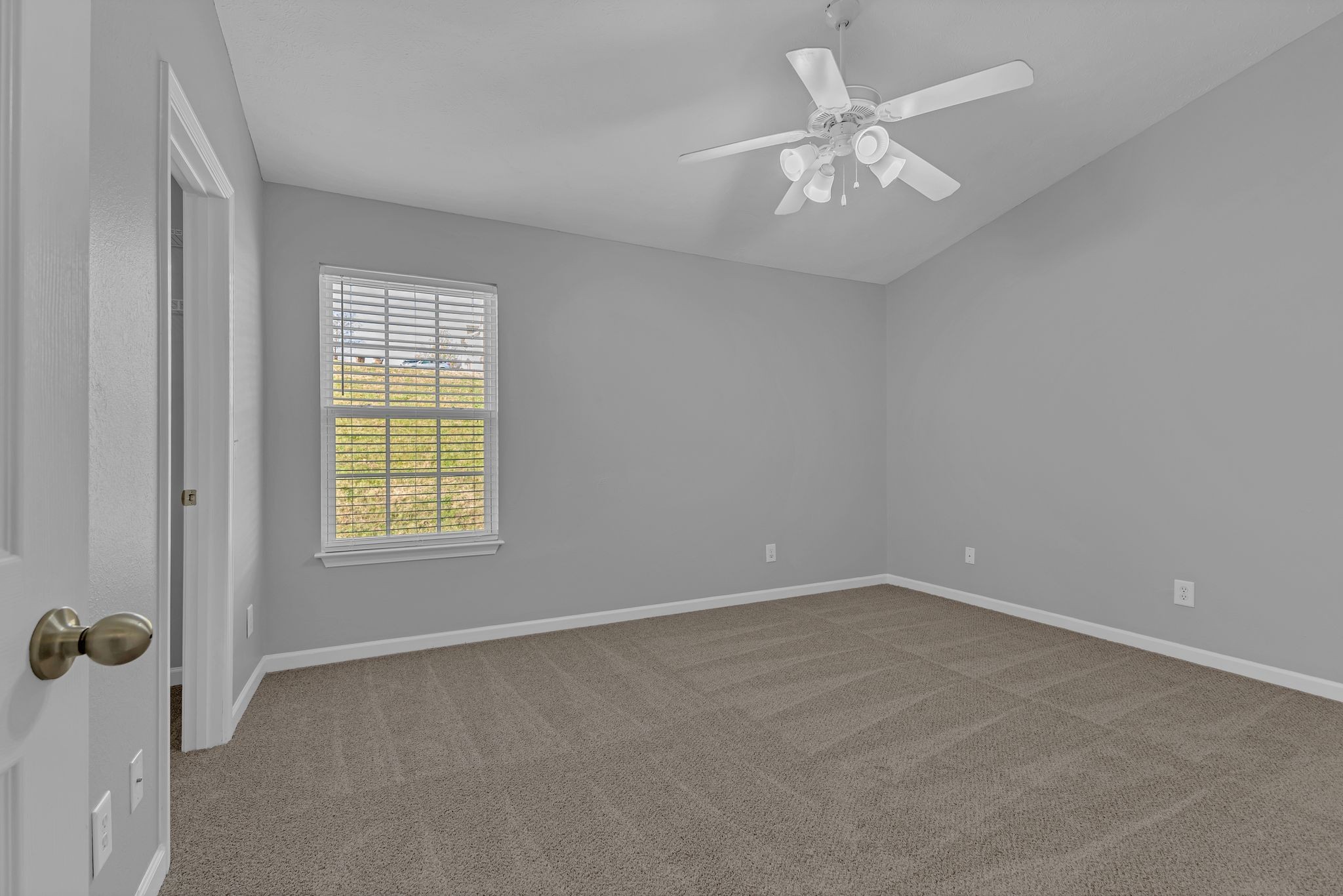 2011 Shaylin Loop, Unit 2011 Antioch, TN 37013 - Photo 21 of 26 an empty room with windows and fan