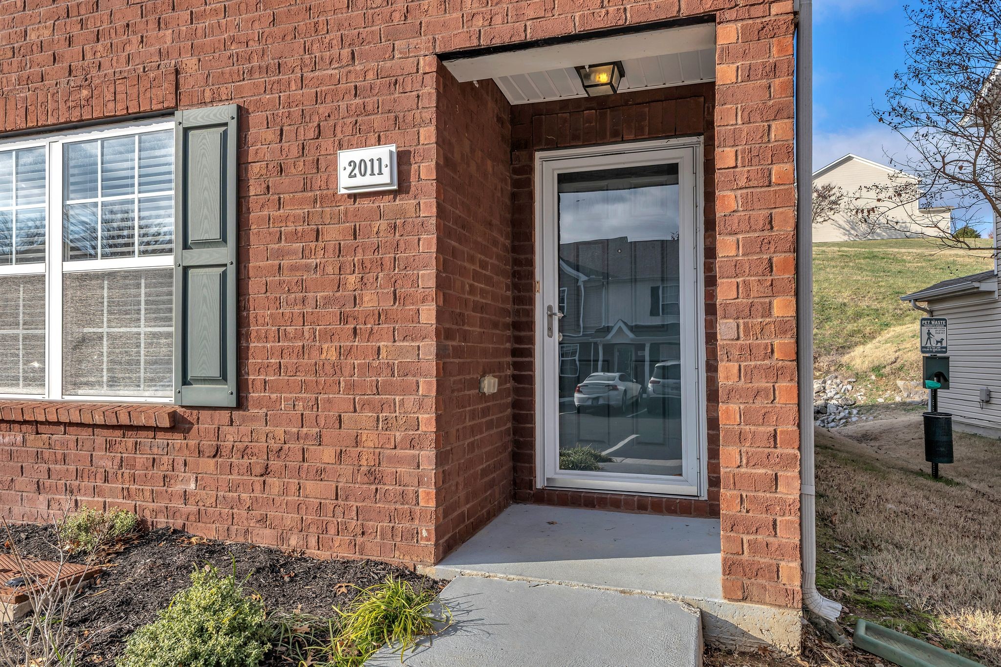 2011 Shaylin Loop, Unit 2011 Antioch, TN 37013 - Photo 4 of 26 a front view of a house with a yard