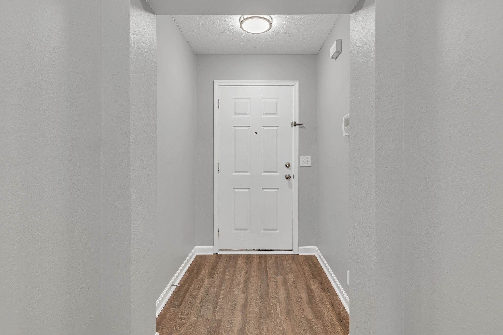 2011 Shaylin Loop, Unit 2011 Antioch, TN 37013 - Photo 6 of 26 a view of a small space with wooden floor and closet