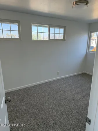 a view of small space with racks on the wall