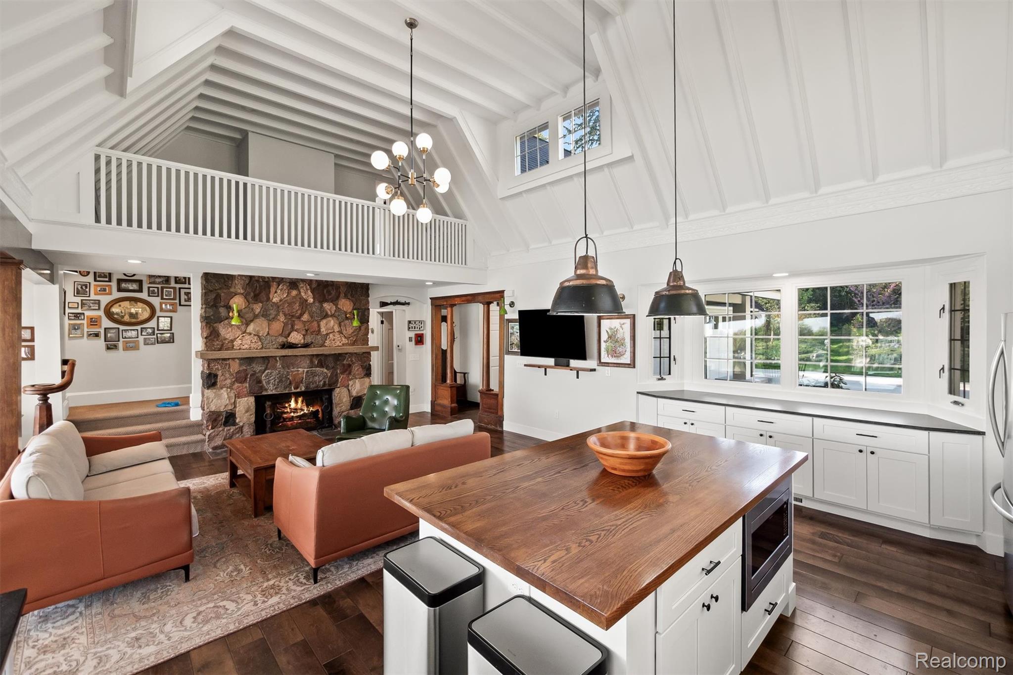 6390 Commerce Road West Bloomfield, MI 48324 - Photo 6 of 74 Combination of living room & kitchen with overhanging loft that housed live bands when entertaining