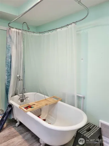 a bathroom with a sink and shower