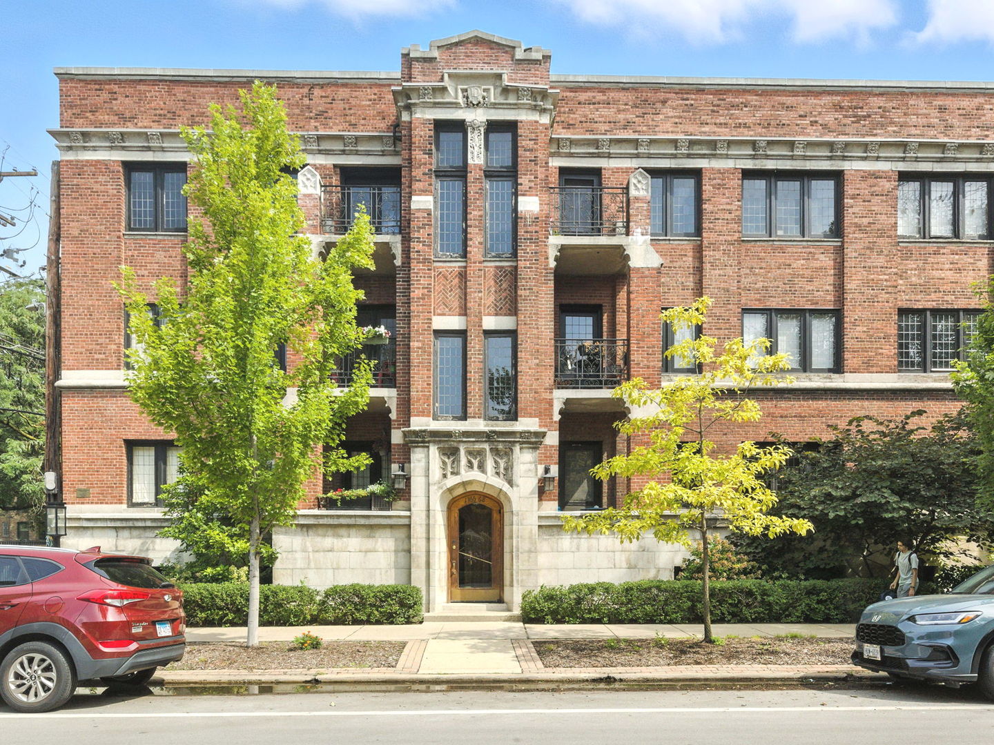 a view of a car parked in front of a building
