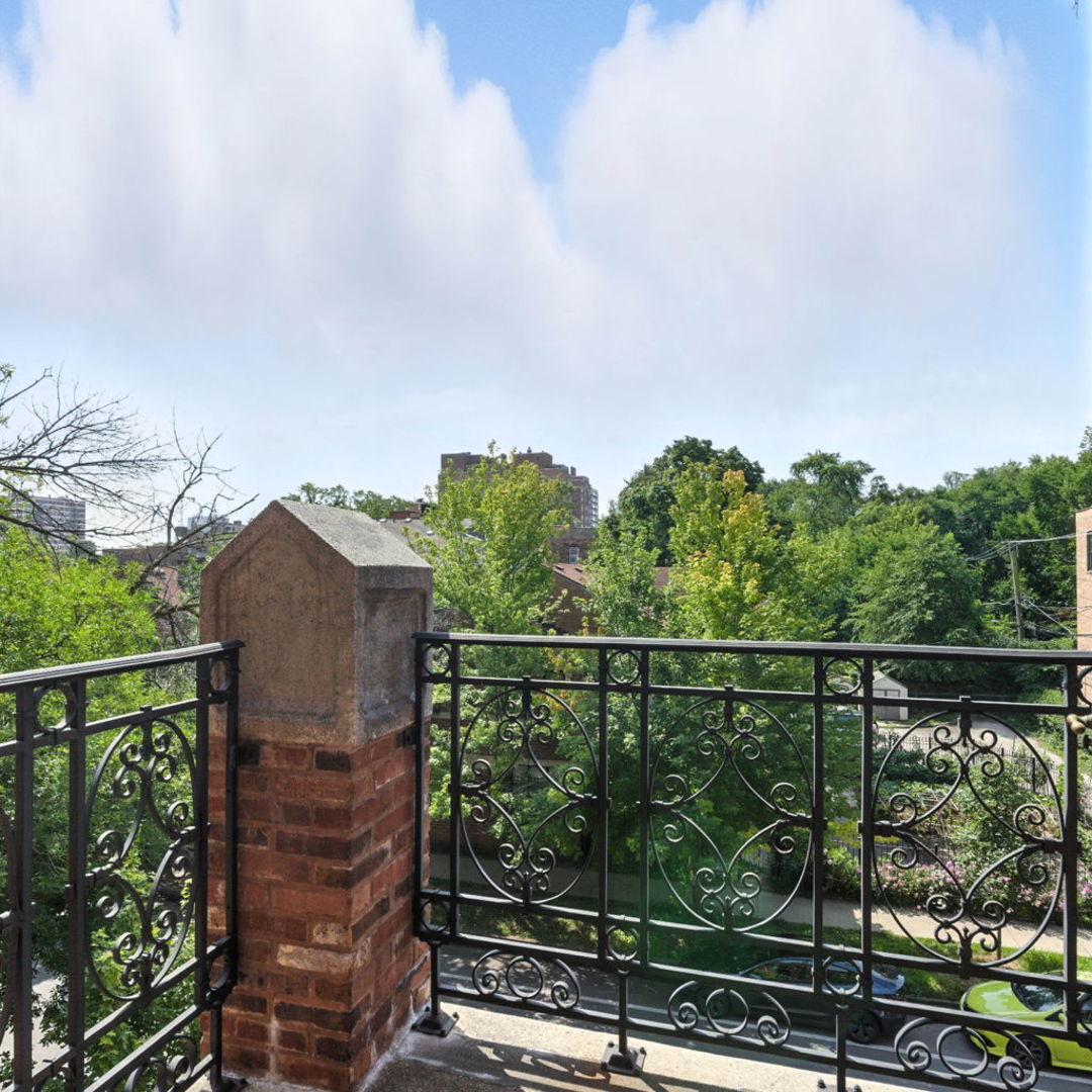 1368 East 57th Street, Unit 3 Chicago, IL 60637 - Photo 12 of 12 a view of a roof and wooden floor