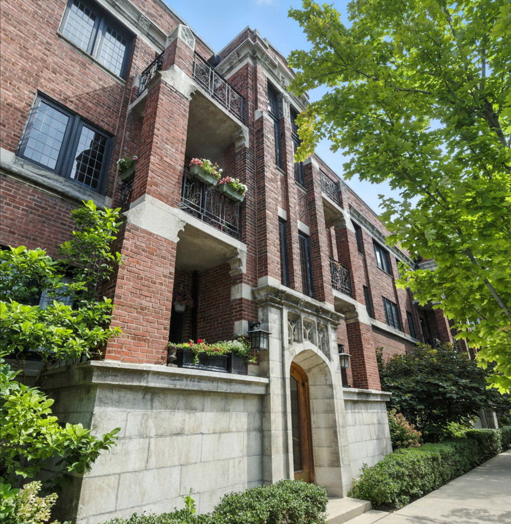 1368 East 57th Street, Unit 3 Chicago, IL 60637 - Photo 2 of 12 a front view of a house with balcony