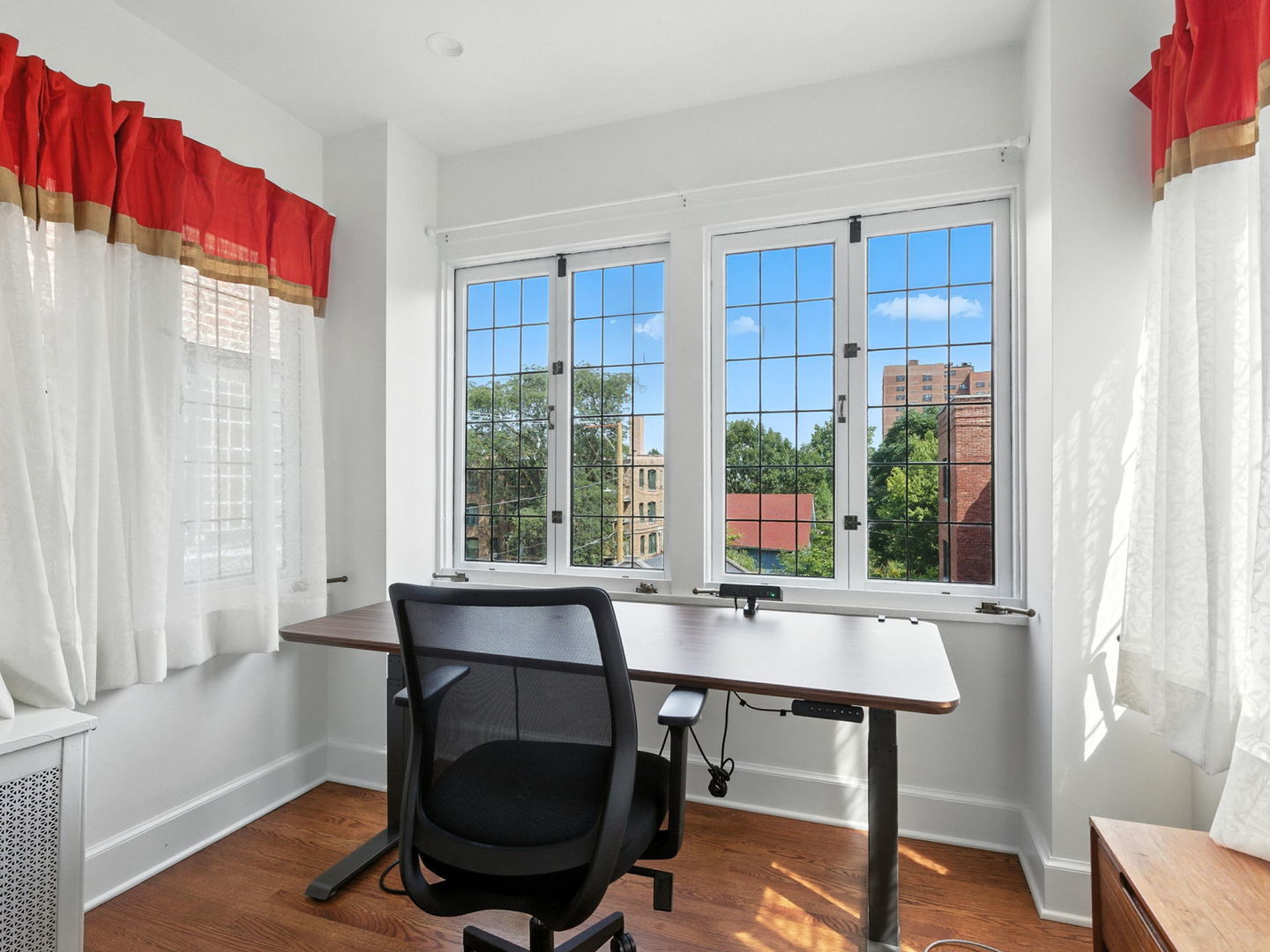 1368 East 57th Street, Unit 3 Chicago, IL 60637 - Photo 9 of 12 a view of a workspace with furniture and a window