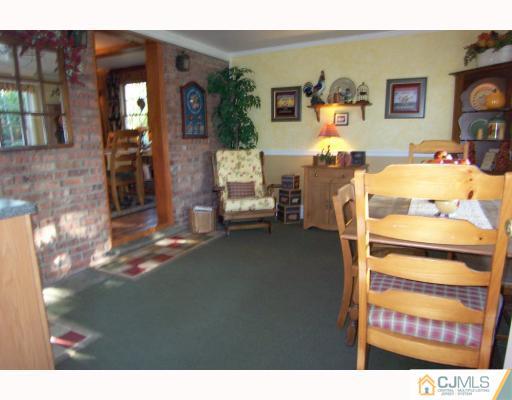 325 Chain O' Hills Road Colonia, NJ 07067 - Photo 5 of 10 a bed room with a bed
