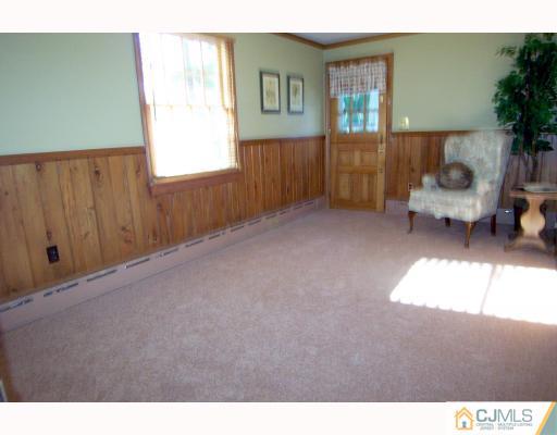 325 Chain O' Hills Road Colonia, NJ 07067 - Photo 6 of 10 a very nice looking room with a window and a couch