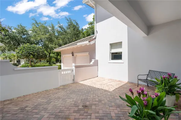 a view of front door with potted plant