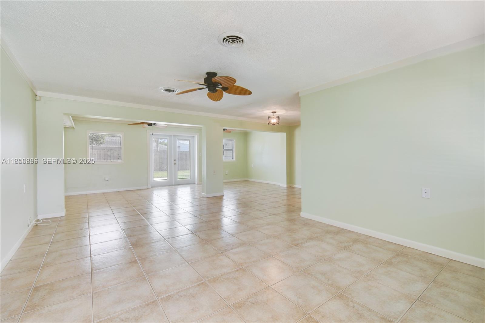 110 Windsor Road East Jupiter, FL 33469 - Photo 13 of 30 a view of a livingroom with wooden floor and a window