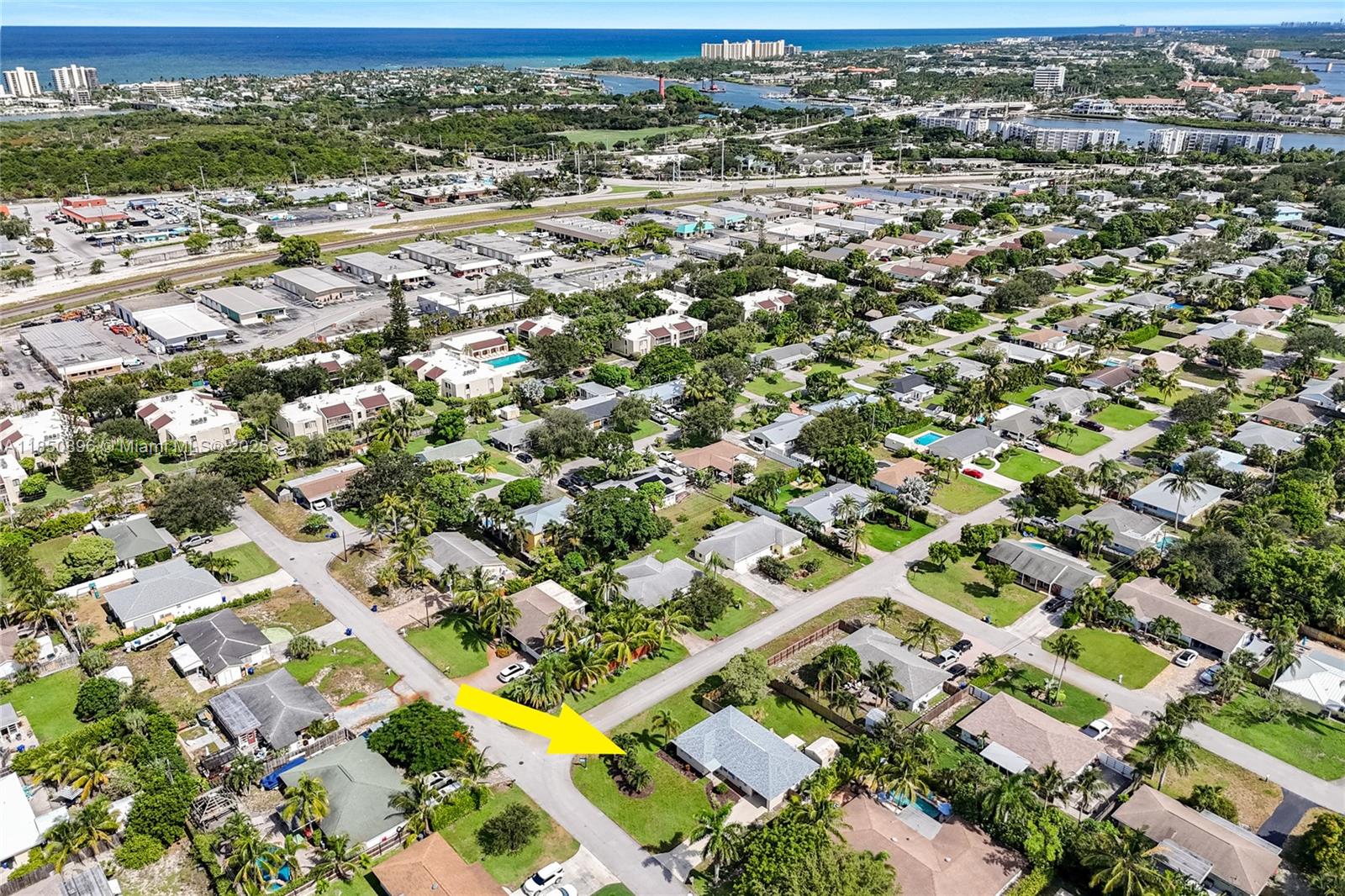 110 Windsor Road East Jupiter, FL 33469 - Photo 6 of 30 an aerial view of residential houses with outdoor space