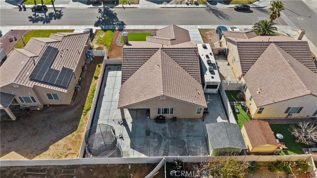 11780 Poppy Road Adelanto, CA 92301 - Photo 32 of 35 an aerial view of a house with swimming pool