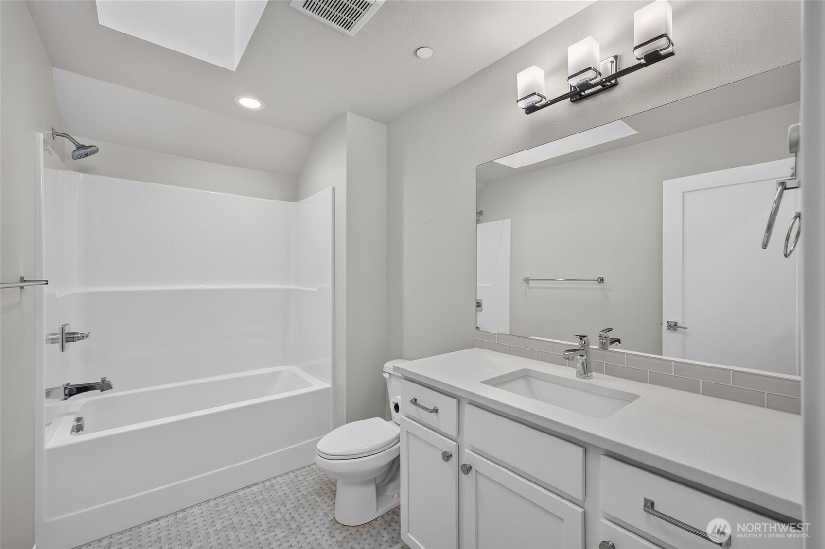 4780 Spring Brook Street Bellingham, WA 98226 - Photo 34 of 40 a bathroom with a sink a toilet and shower