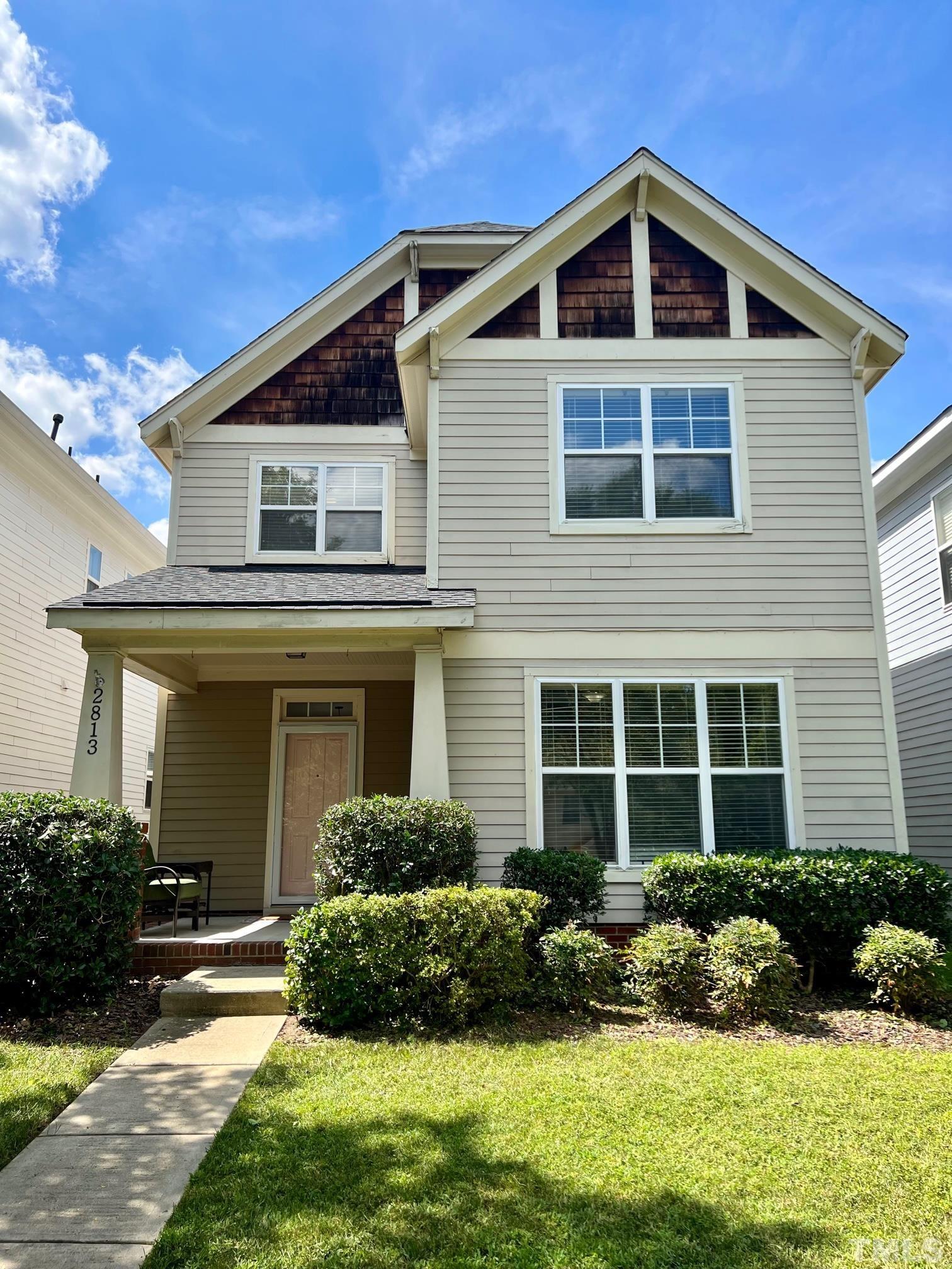 2813 Falls River Avenue Raleigh, NC 27614 - Photo 1 of 28 a front view of a house with a yard