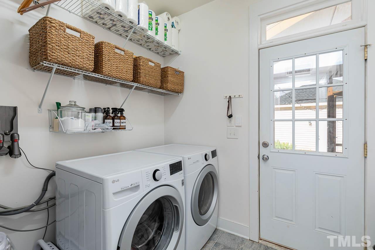 2813 Falls River Avenue Raleigh, NC 27614 - Photo 13 of 28 a utility room with dryer and washer