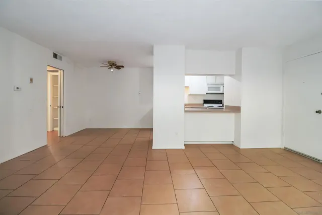 a bedroom with a bed and a cabinets