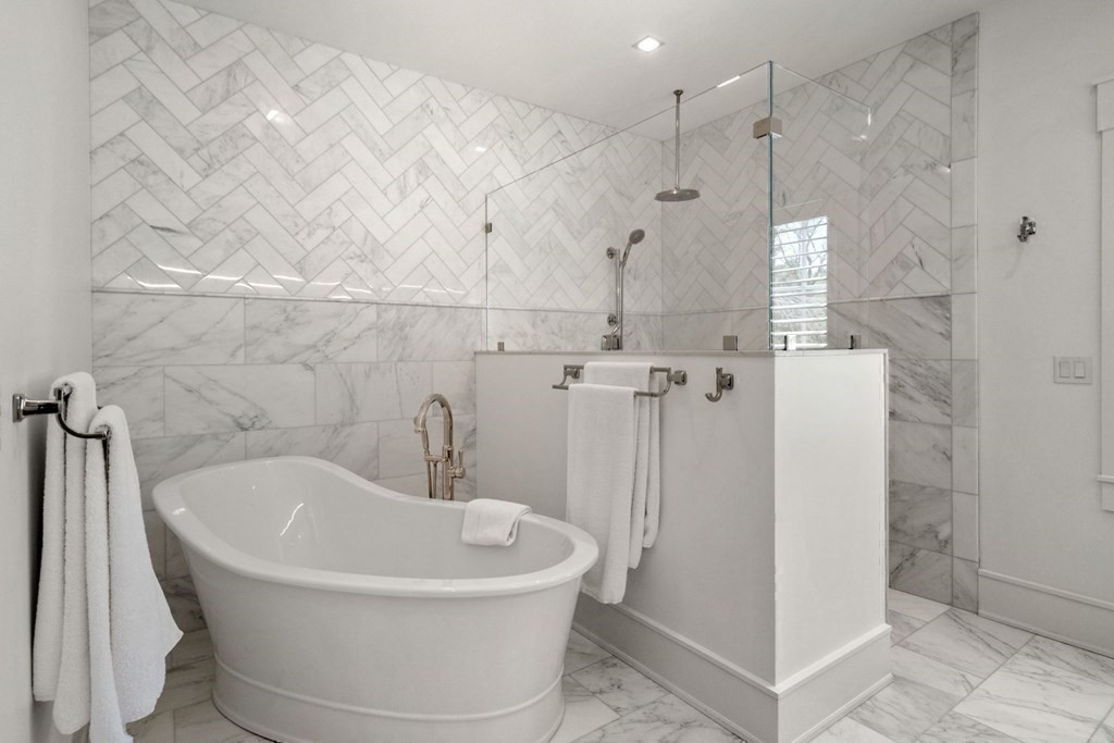 151 Forest Street Sherborn, MA 01770 - Photo 20 of 41 a white bath tub sitting in a bathroom and shower