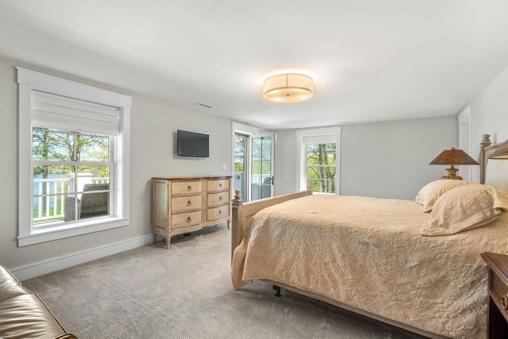 151 Forest Street Sherborn, MA 01770 - Photo 21 of 41 a bedroom with a bed and a window