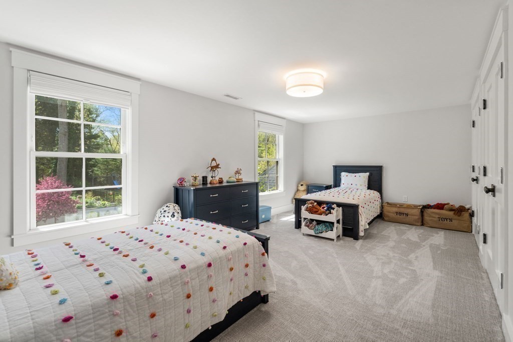 151 Forest Street Sherborn, MA 01770 - Photo 24 of 41 a bedroom with a bed and a window