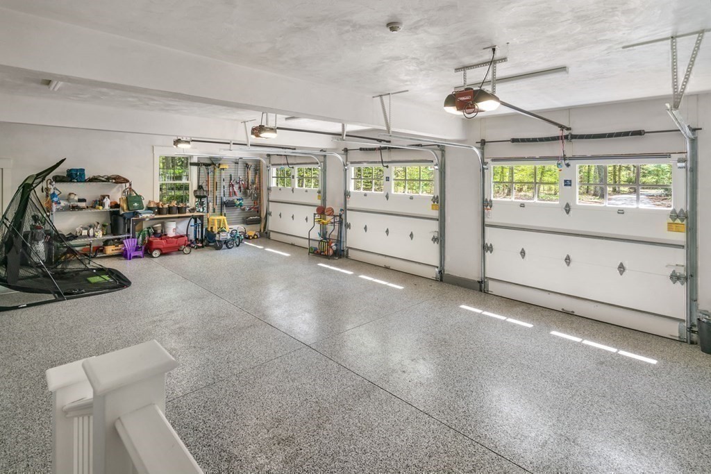 151 Forest Street Sherborn, MA 01770 - Photo 28 of 41 a view of a livingroom with furniture hardwood floor and a ceiling fan