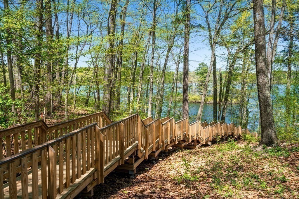 151 Forest Street Sherborn, MA 01770 - Photo 34 of 41 a view of a pathway of a house with wooden fence