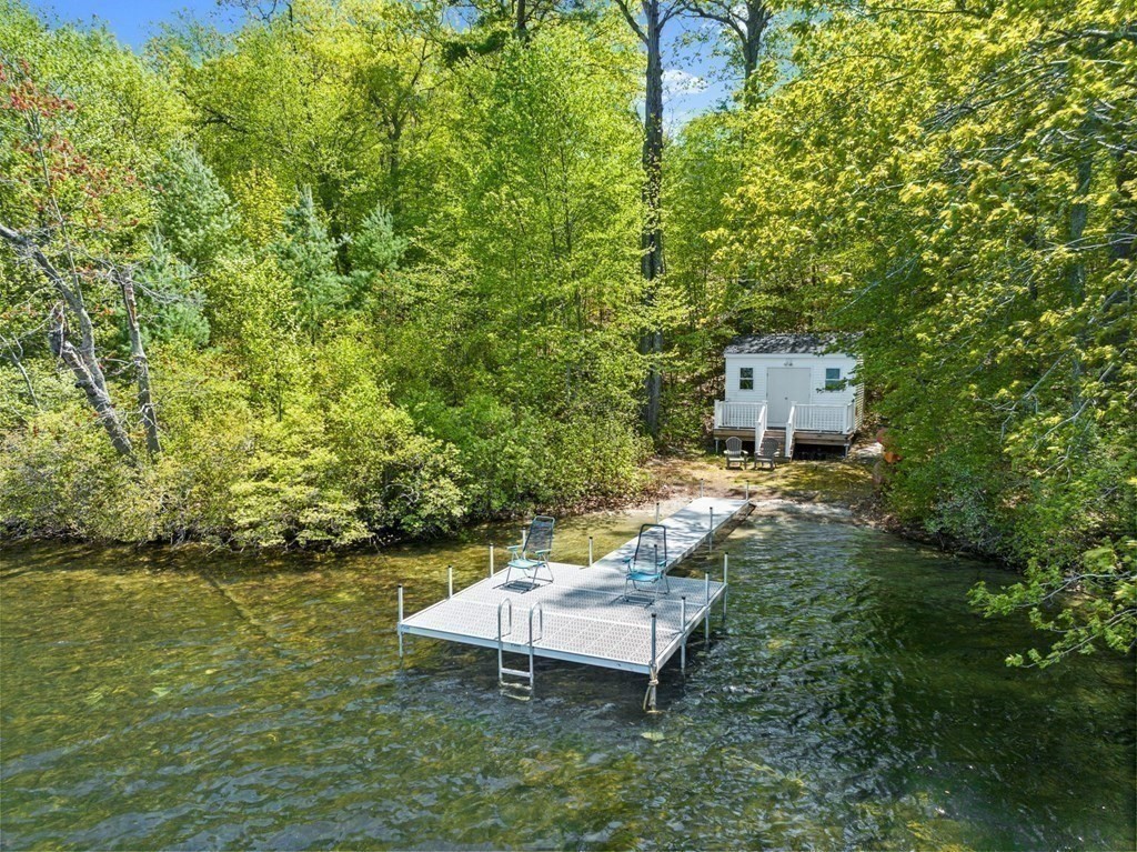 151 Forest Street Sherborn, MA 01770 - Photo 37 of 41 a backyard of a house with lots of green space