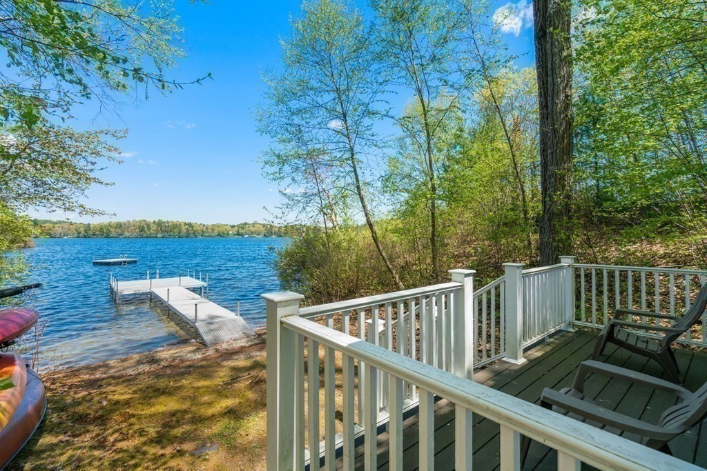 151 Forest Street Sherborn, MA 01770 - Photo 4 of 41 a view of a balcony with wooden floor and outdoor space