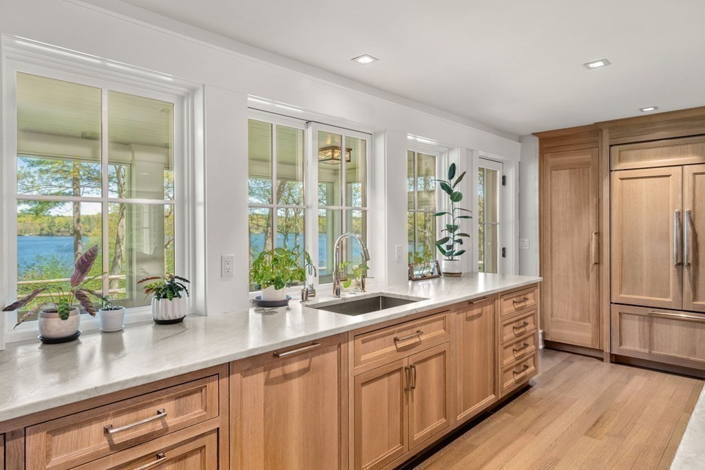 151 Forest Street Sherborn, MA 01770 - Photo 9 of 41 a kitchen with sink refrigerator and large window