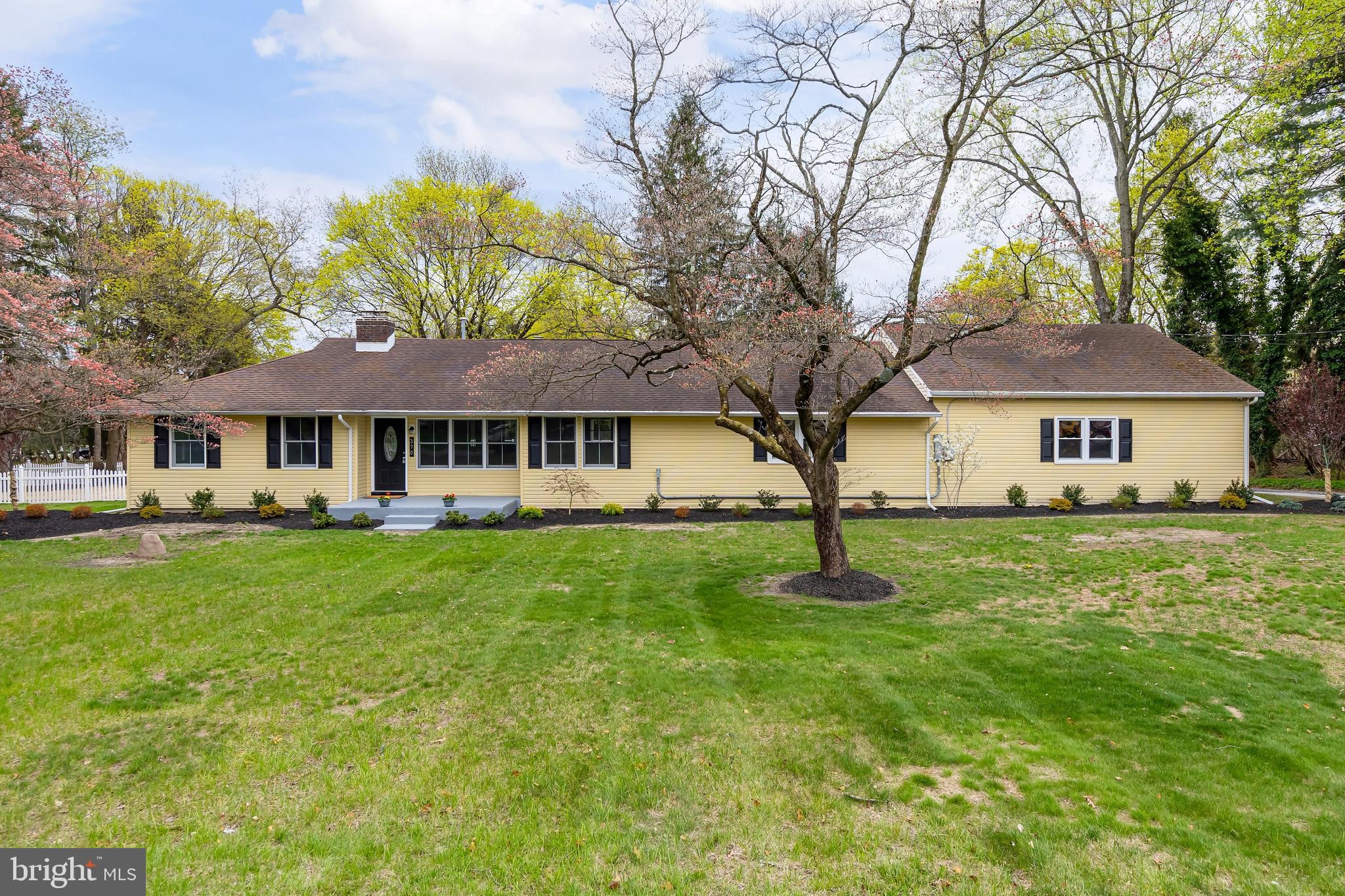 370 Ganttown Road Sewell, NJ 08080 - Photo 1 of 46 a front view of a house with a garden