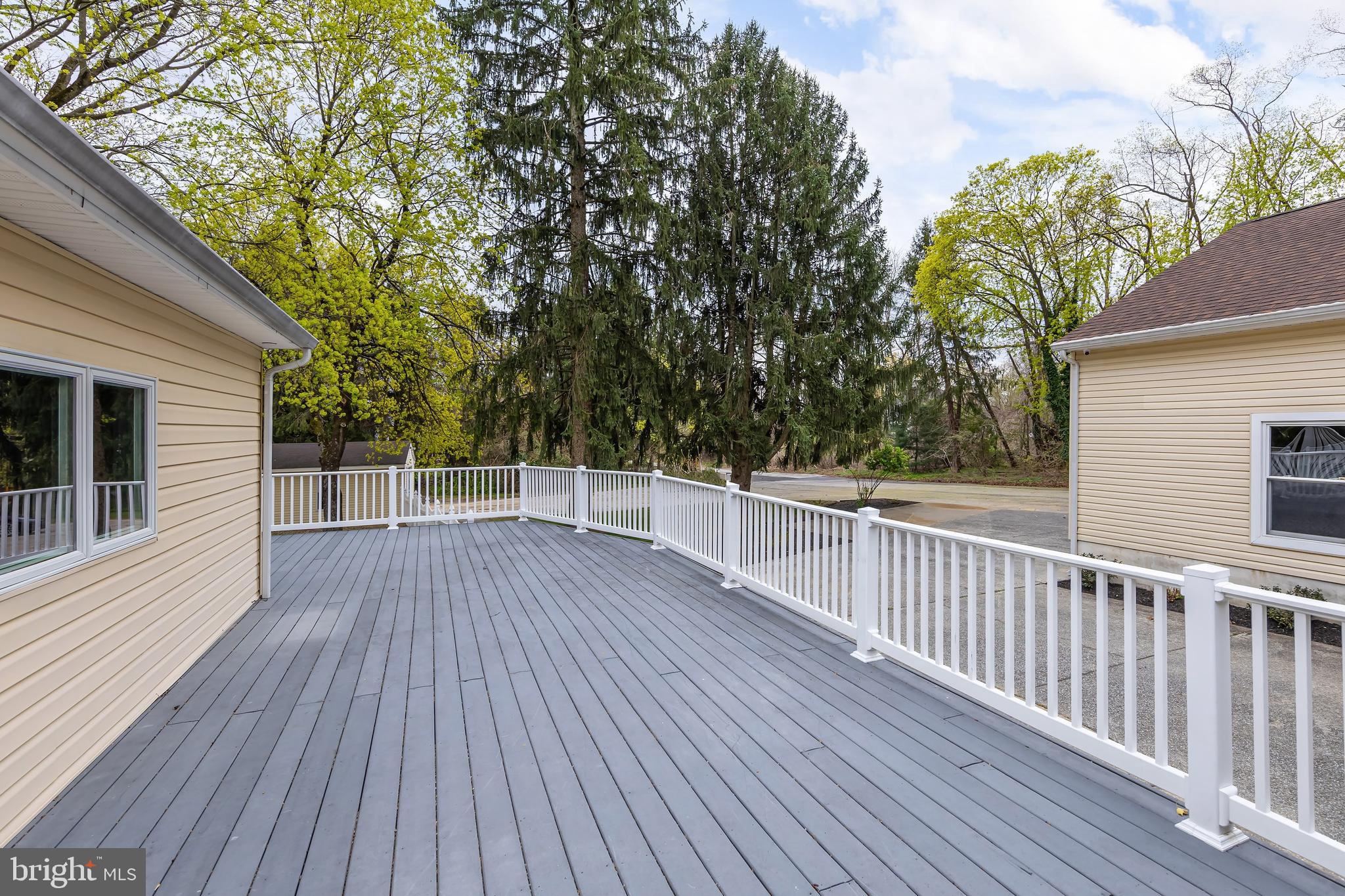 370 Ganttown Road Sewell, NJ 08080 - Photo 15 of 46 a view of a roof deck with wooden floor and fence