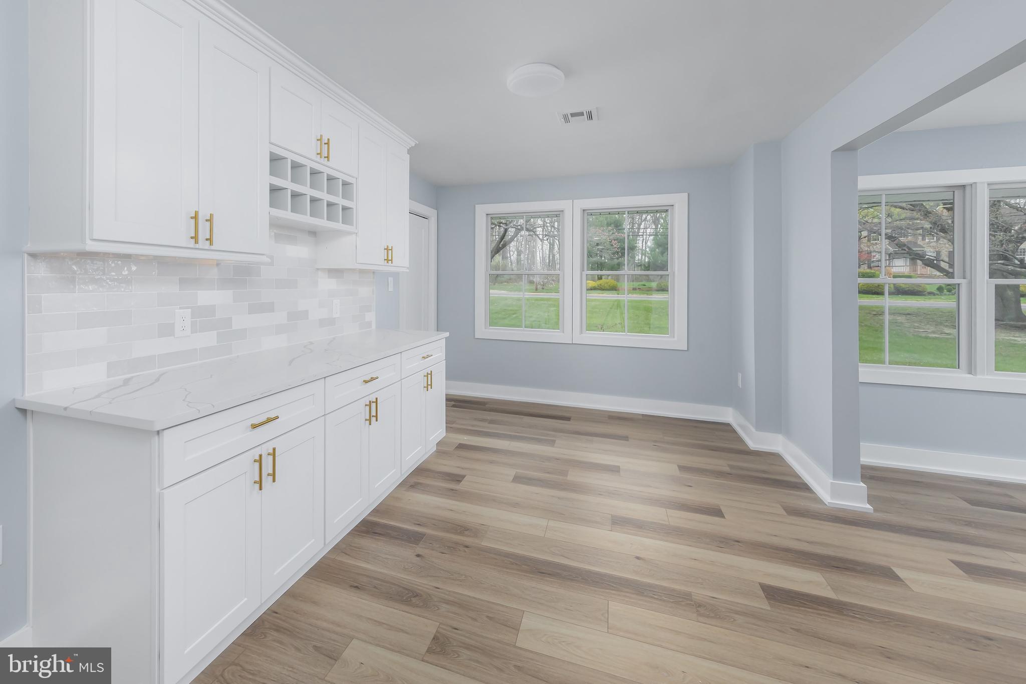370 Ganttown Road Sewell, NJ 08080 - Photo 22 of 46 a view of a kitchen with wooden floor and windows
