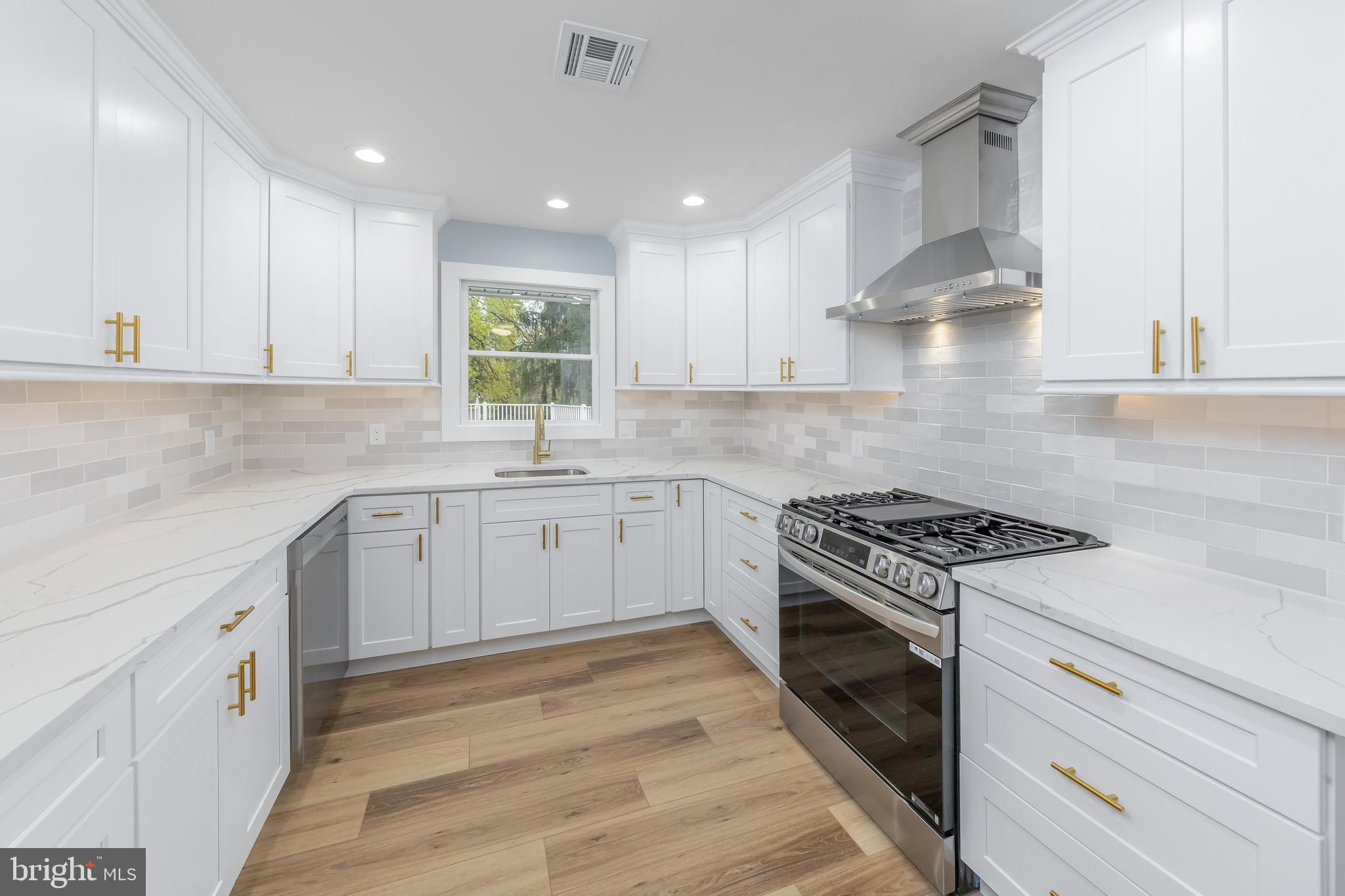 370 Ganttown Road Sewell, NJ 08080 - Photo 24 of 46 a kitchen with cabinets appliances a sink and a window