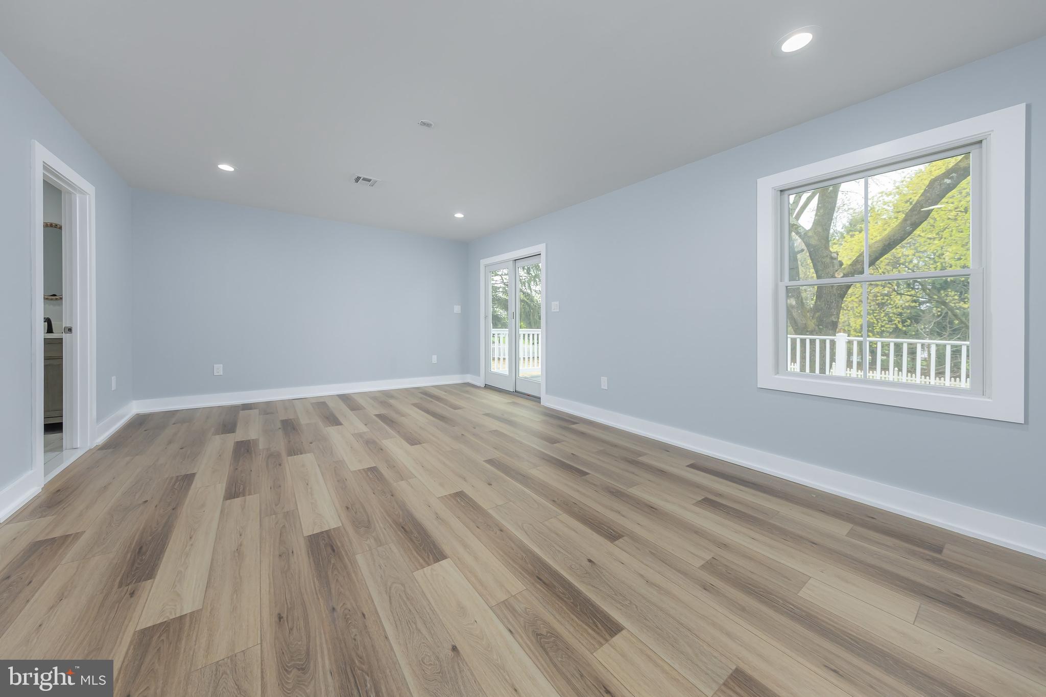 370 Ganttown Road Sewell, NJ 08080 - Photo 25 of 46 a view of empty room with wooden floor and fan