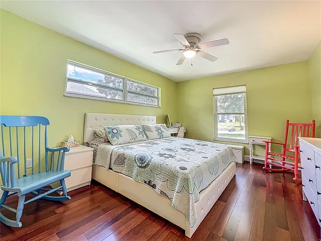 a view of a swimming pool with a yard