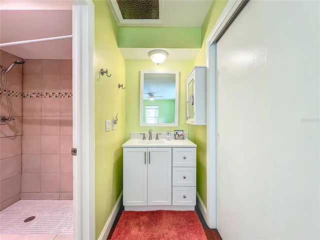 an aerial view of a house with a garden and plants