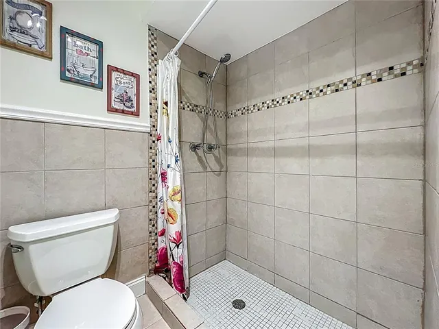 an aerial view of residential building and green space