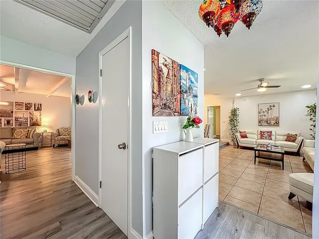 a living room with furniture and a table