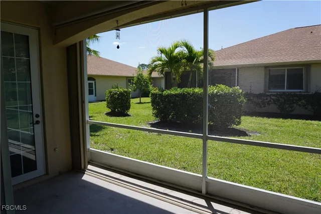 a plant is in front of a door