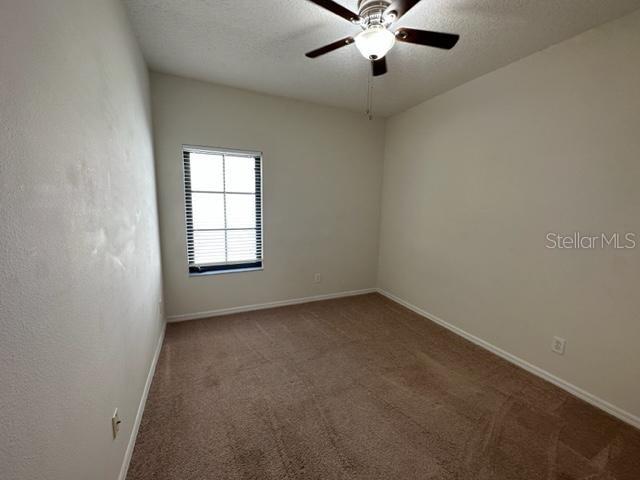 906 Pawstand Road Celebration, FL 34747 - Photo 20 of 29 an empty room with a window
