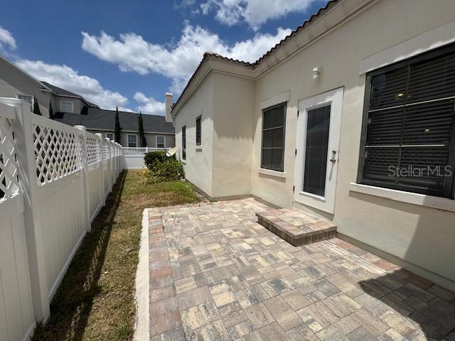 906 Pawstand Road Celebration, FL 34747 - Photo 27 of 29 a view of a house with a snow in a yard