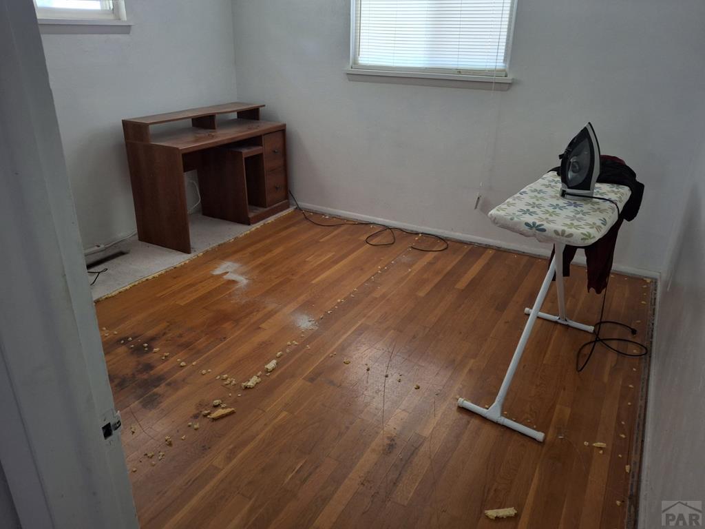 214 3rd Street Fowler, CO 81039 - Photo 9 of 15 a room with furniture and a window