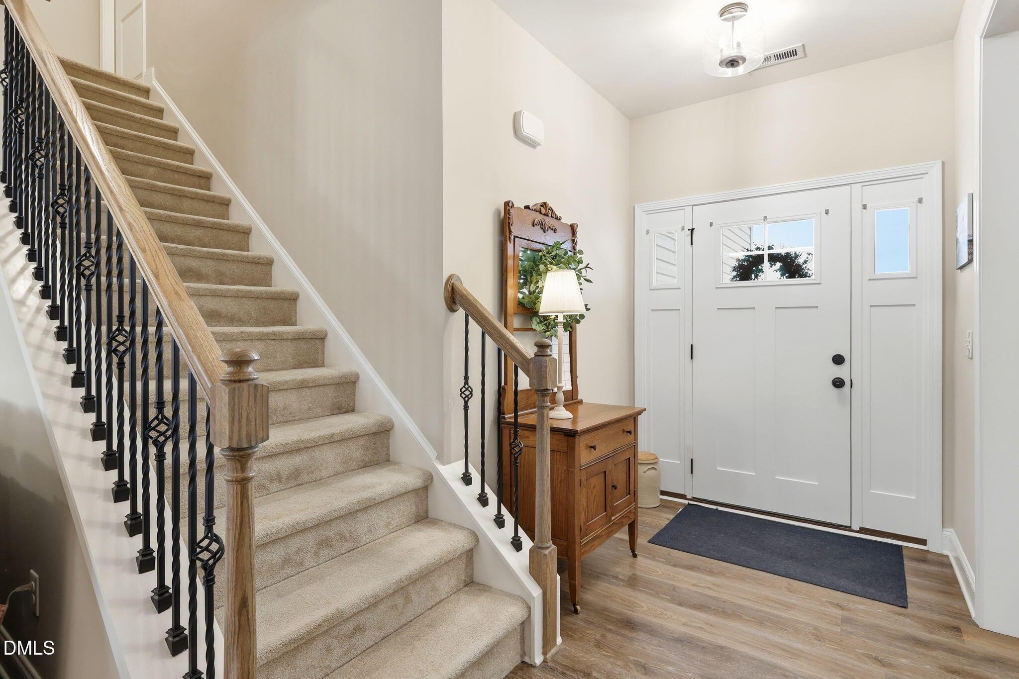 5098 Spring Hill Church Road Lillington, NC 27546 - Photo 23 of 36 a view of a hallway with wooden floor and entryway