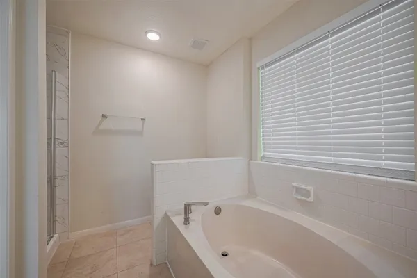 a bathroom with a bathtub