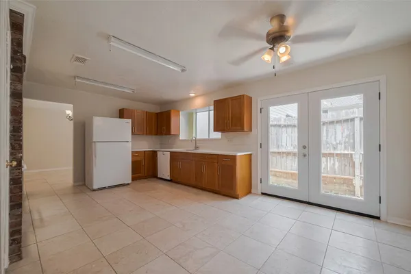 a view of a kitchen with furniture and a kitchen