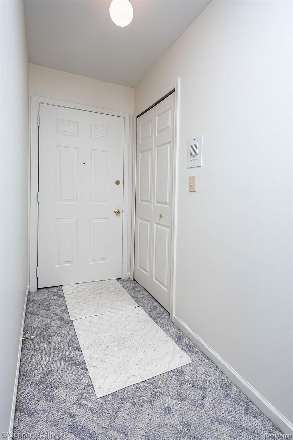 1660 River Road, Unit 53 Marysville, MI 48040 - Photo 9 of 31 Doorway featuring carpet floors