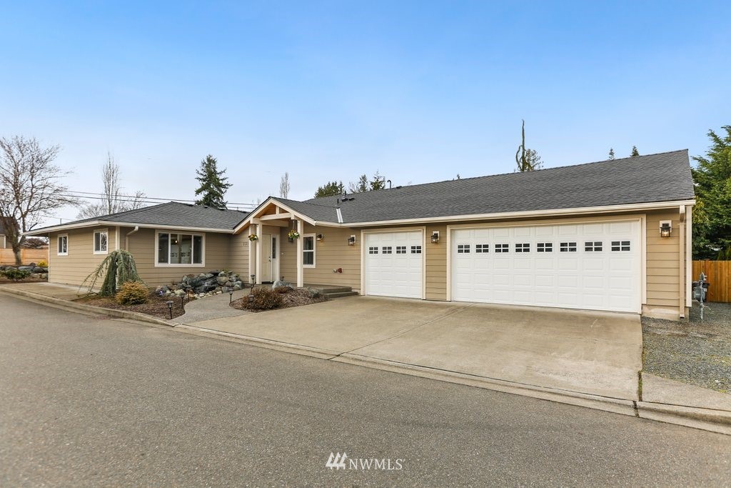 2329 Cedar Road Lake Stevens, WA 98258 - Photo 1 of 40 a view of a house with a yard and garage