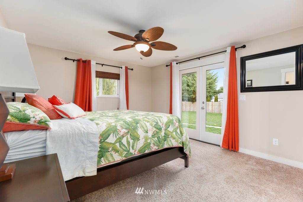 2329 Cedar Road Lake Stevens, WA 98258 - Photo 15 of 40 a bed sitting in a bedroom next to a window